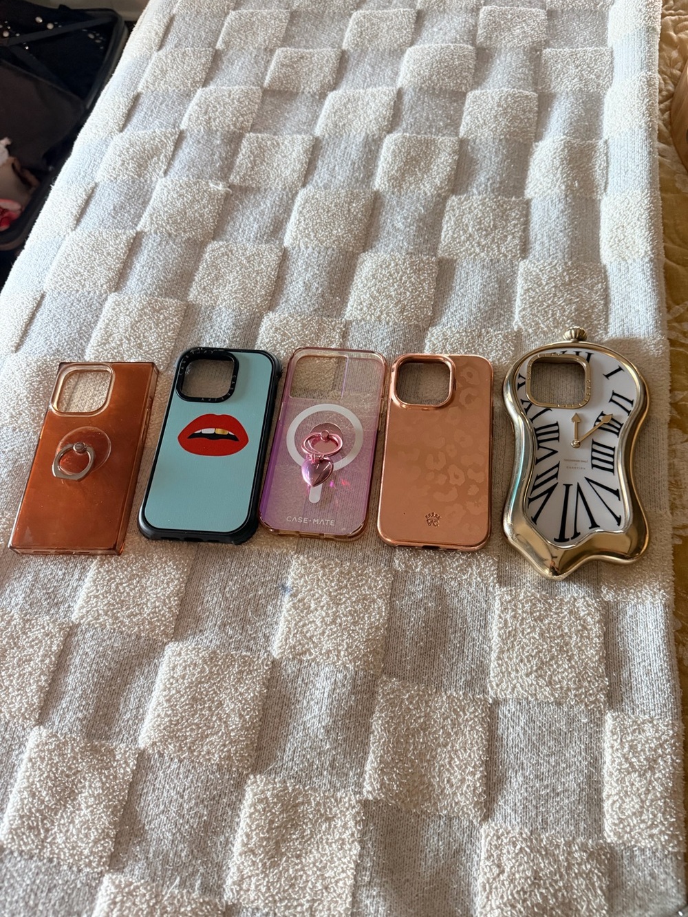 Set of 5 iPhone 15 Pro cases in Rose Gold, Teal, Pink, and Gold